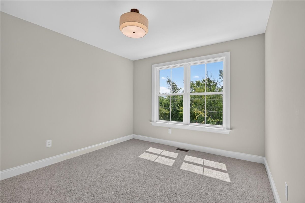 Avondale Walk secondary bedroom with natural light