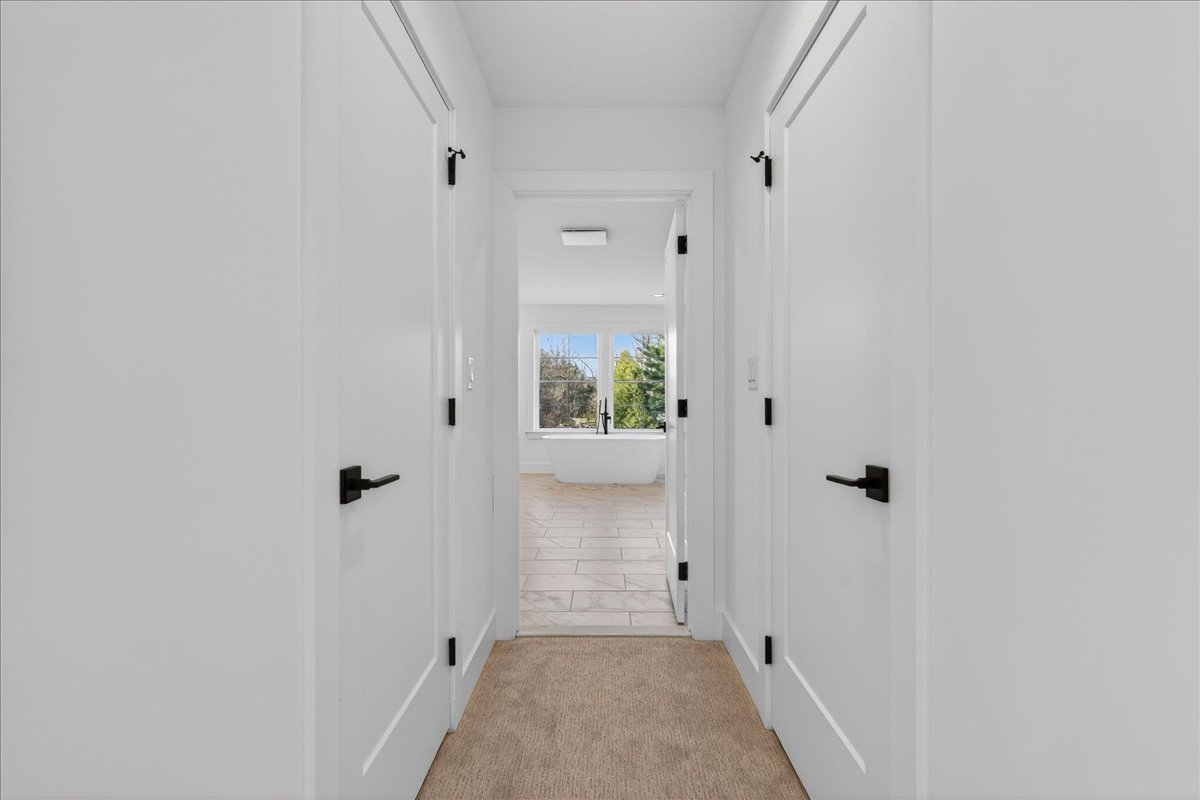 Hallway to primary bath