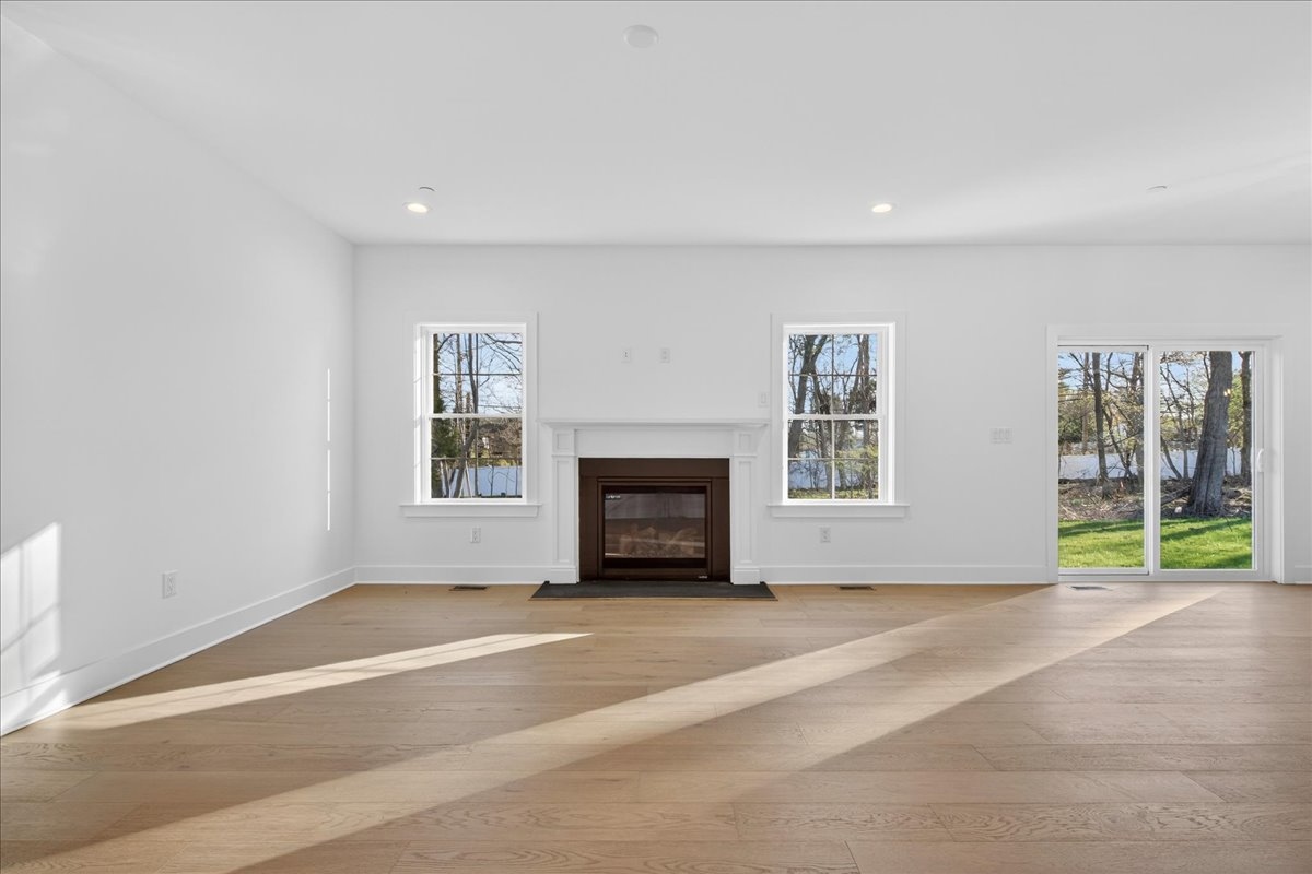 Open concept living, kitchen, and staircase