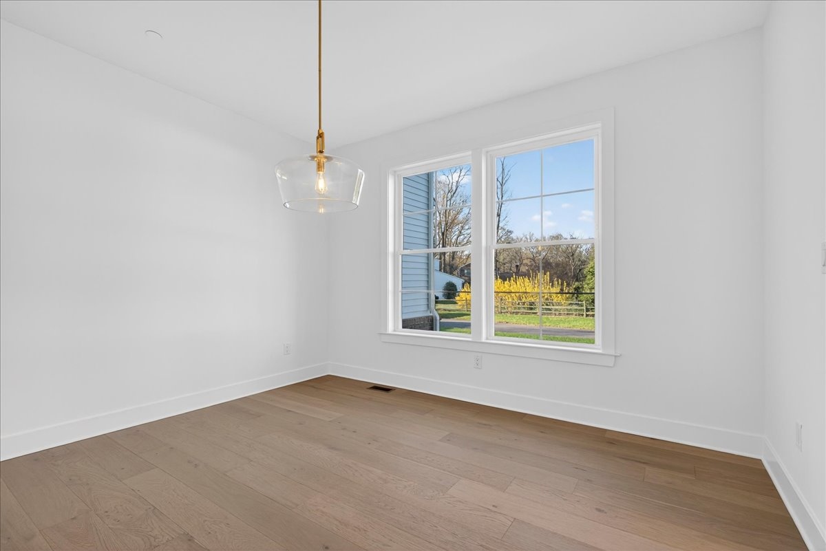 Dining and foyer with chandelier