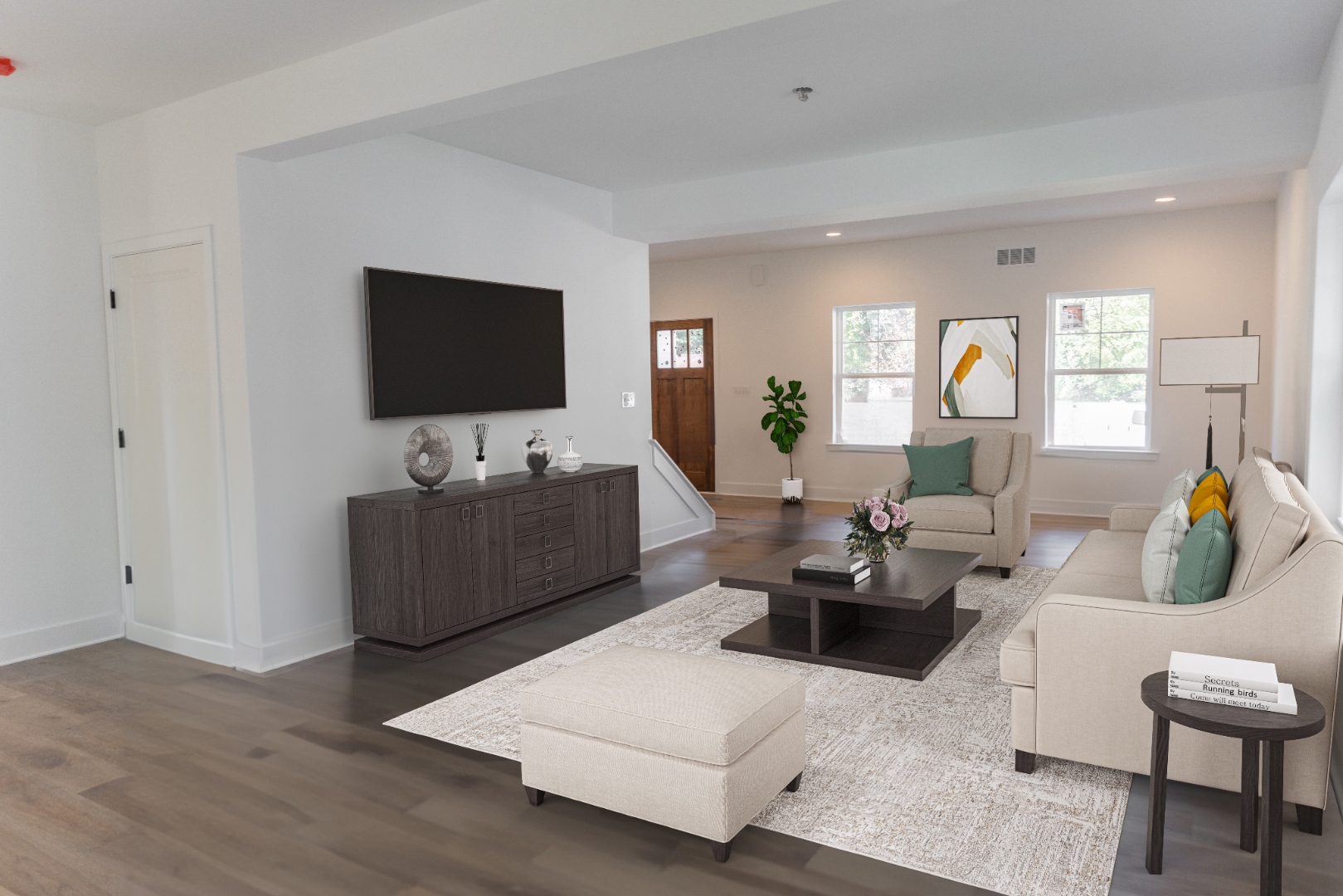 Worthington living room with fireplace wall and staged furnishings