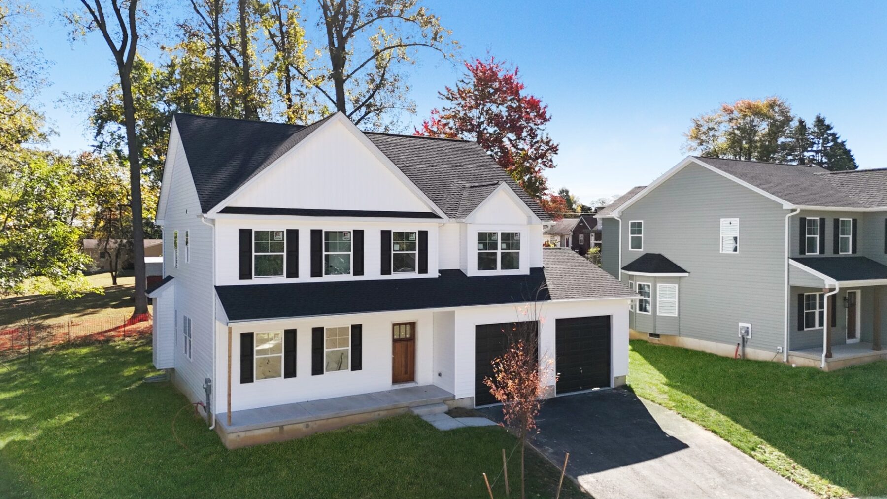 The Worthington model — 4 bedroom home with covered porch and 24-foot two-car garage
